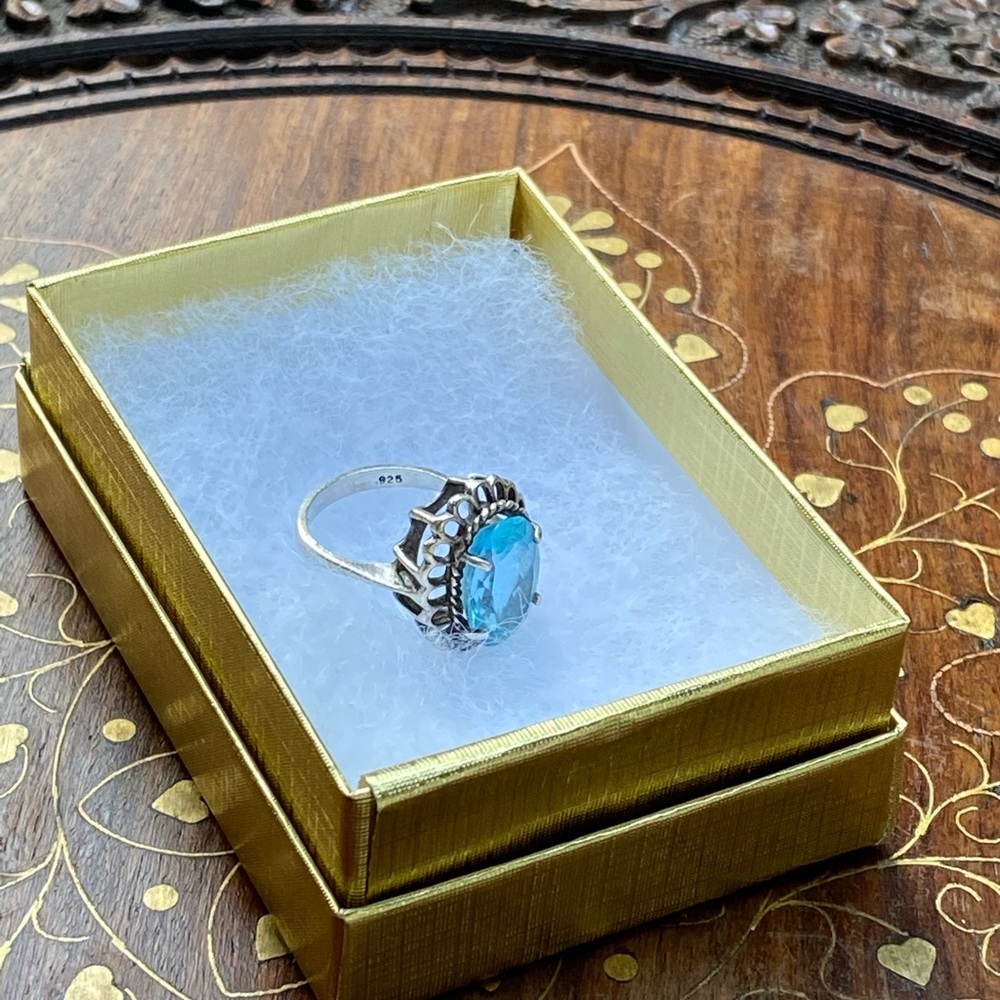 Silver ring with blue topaz stone, size 7